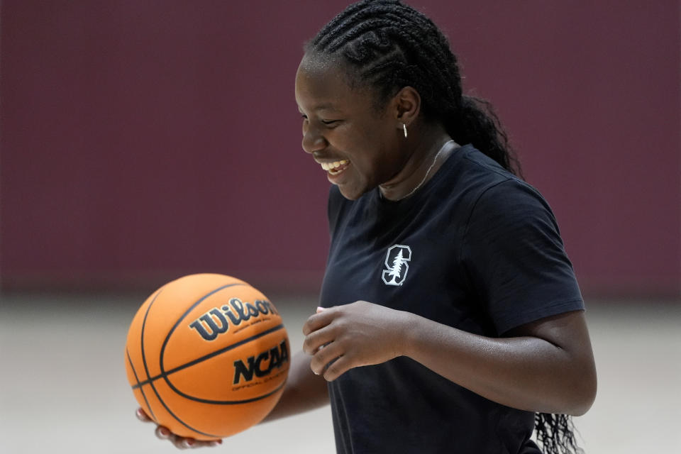 Shay Ijiwoye, who played basketball at Desert Vista High in Phoenix and has committed to Stanford University, works out Monday, March 18, 2024, in Chandler, Ariz. Iowa’s Caitlin Clark has reshaped women's college basketball and the perception of it. Up-and-coming players have taken notice, working to extend their range to be like her. (AP Photo/Matt York)