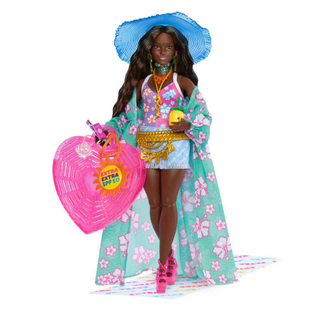 <p>Barbie Travel Doll with Beach Fashion, Extra Fly, $25, <a href="https://shop.mattel.com/products/barbie-extra-fly-doll-hpb14" rel="nofollow noopener" target="_blank" data-ylk="slk:available here;elm:context_link;itc:0;sec:content-canvas" class="link ">available here</a></p><p>Photo: Courtesy of Barbie</p>