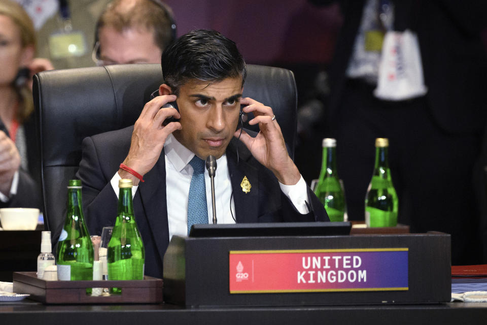 FILE - Britain's Prime Minister Rishi Sunak attends a working session on food and energy security at the G20 Summit in Nusa Dua, Bali, Indonesia, Nov. 15, 2022. In his first month as Britain's prime minister, Sunak has stabilized the economy, reassured allies from Washington to Kyiv and even soothed the European Union after years of sparring between Britain and the bloc. But Sunak’s challenges are just beginning. He is facing a stagnating economy, a cost-of-living crisis – and a Conservative Party that is fractious and increasingly unpopular after 12 years in power. (Leon Neal/Pool Photo via AP, File)