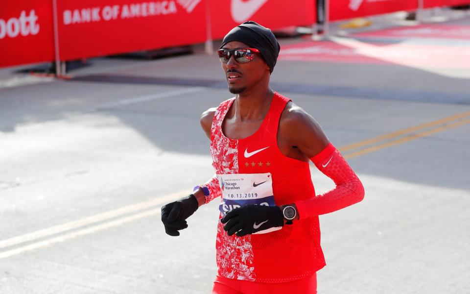 Mo Farah, running here at the Chicago Marathon, was coached by Alberto Salazar but he has never failed a drugs test - REUTERS