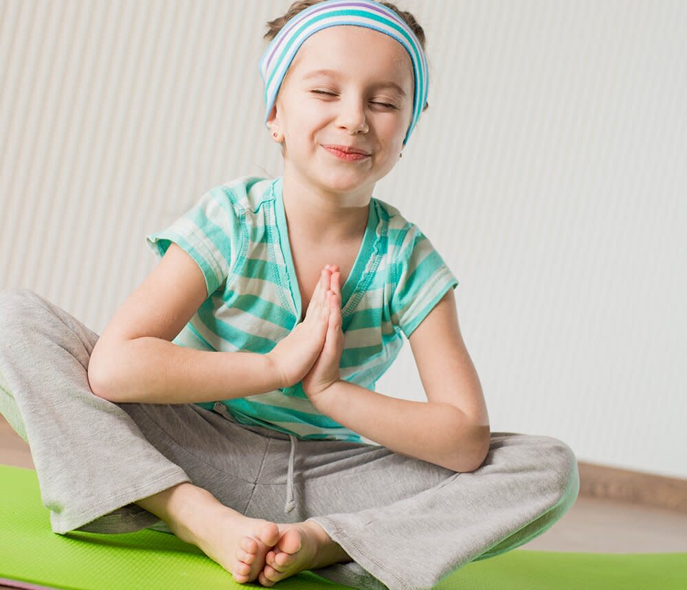 happy young girl meditating