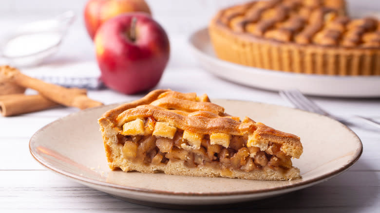 Slice of apple pie on plate