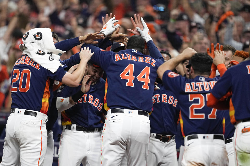 Houston Astros' Yordan Alvarez celebrates his three-run home run during the sixth inning in Game sixth of baseball's World Series between the Houston Astros and the Philadelphia Phillies on Saturday, Nov. 5, 2022, in Houston. (AP Photo/Tony Gutierrez)