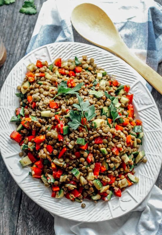 <p>Destination Delish</p><p>A healthy and vibrant salad chocked full of hearty lentils and crunchy vegetables tossed in a balsamic vinaigrette dressing.</p><p><strong>Get the recipe: <a href="https://www.destinationdelish.com/balsamic-lentil-salad/" rel="nofollow noopener" target="_blank" data-ylk="slk:Balsamic Lentil Salad;elm:context_link;itc:0;sec:content-canvas" class="link ">Balsamic Lentil Salad</a></strong></p><p><strong>Related: <a href="https://parade.com/food/fall-salad-recipes" rel="nofollow noopener" target="_blank" data-ylk="slk:55 Best Bountiful Fall Salads;elm:context_link;itc:0;sec:content-canvas" class="link ">55 Best Bountiful Fall Salads</a></strong></p>