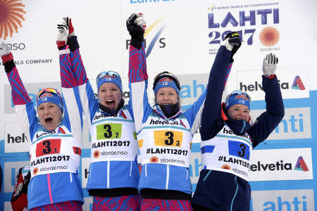 Aino-Kaisa Saarinen, Kerttu Niskanen, Laura Mononen and Krista Parmakoski of Finland after the the Ladies cross-country 4 x 5 km relay competition in the FIS Nordic World Ski Championships in Lahti, Finland, on March 2, 2017. Team Finland finished third. LEHTIKUVA/Markku Ulander via REUTERS