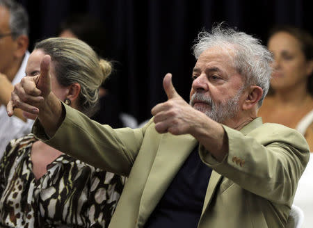 FILE PHOTO: Former Brazilian President Luiz Inacio Lula da Silva reacts at his book launch event in Sao Paulo, Brazil March 16, 2018. REUTERS/Paulo Whitaker