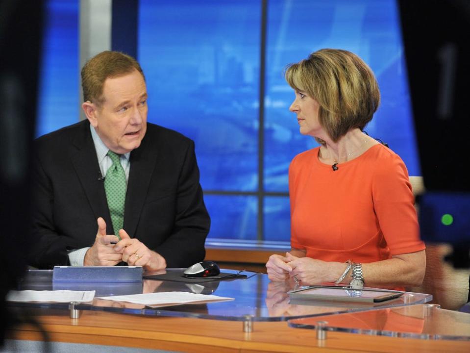 News4Jax anchor Tom Wills, left, is shown with then-anchor Mary Baer on set during a news broadcast at WJXT TV-4 in February 2015. A year after Baer retired in May 2023, Wills has announced his plans to retire.