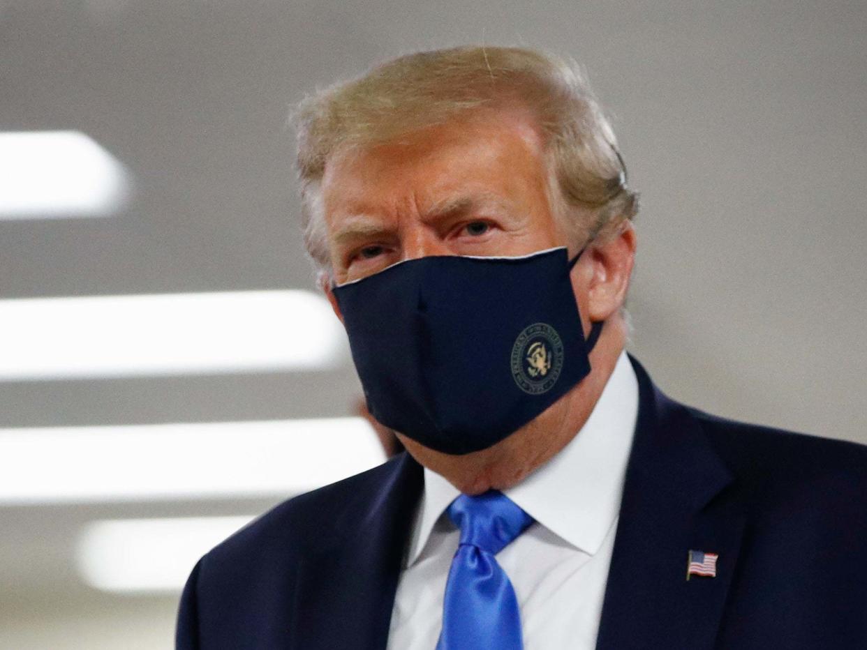 President Donald Trump wears a face mask as he visits Walter Reed National Military Medical Centre in Bethesda, Md., 11 July 2020: AP