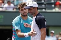 Mar 25, 2017; Miami, FL, USA; Stan Wawrinka of Switzerland (L) shakes hands with Horacio Zeballos of Argentina (R) after their match on day five of the 2017 Miami Open at Crandon Park Tennis Center. Wawrinka won 6-3, 6-4. Mandatory Credit: Geoff Burke-USA TODAY Sports