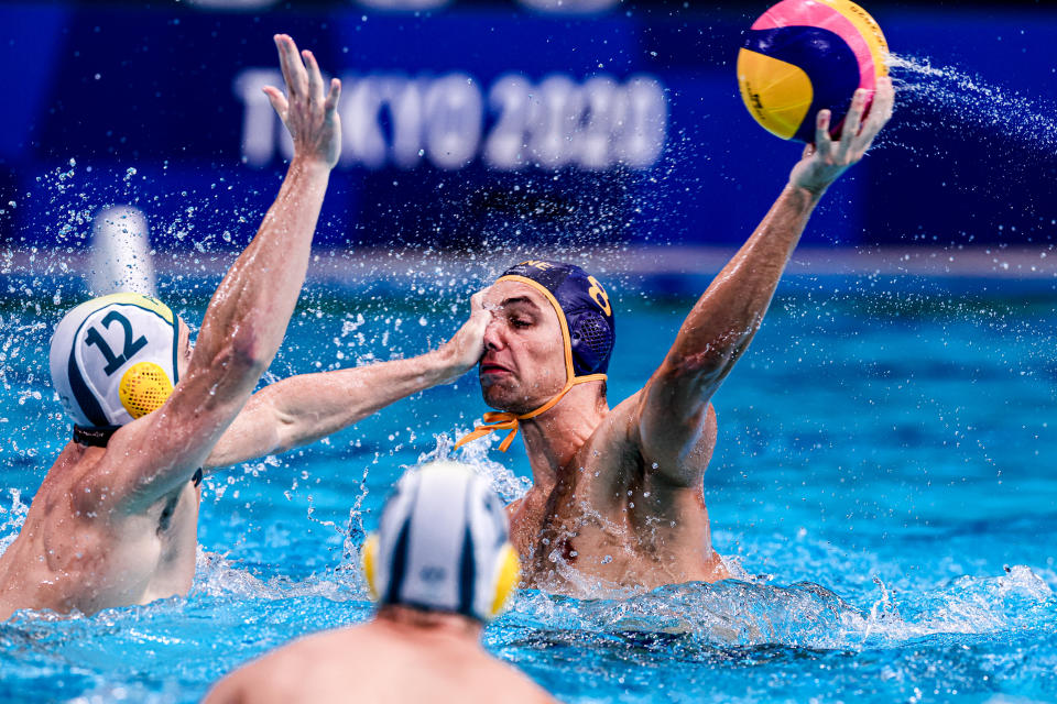 <p>TOKYO, JAPAN - JULY 25: Blake Edwards of Australia hitting the face of Aleksa Ukropina of Montenegro during the Tokyo 2020 Olympic Waterpolo Tournament Men match between Team Australia and Team Montenegro at Tatsumi Waterpolo Centre on July 25, 2021 in Tokyo, Japan (Photo by Marcel ter Bals/BSR Agency/Getty Images)</p> 