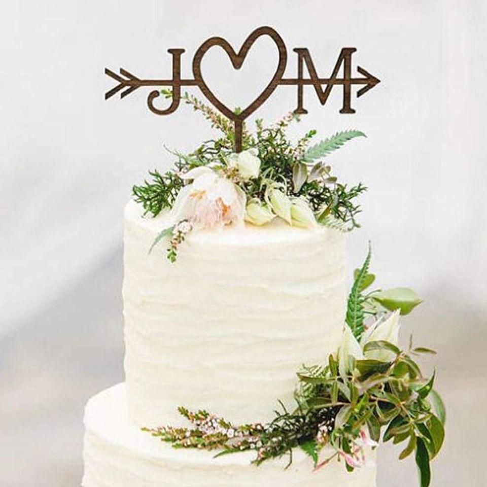 7) Rustic Wedding Arrow Cake Topper