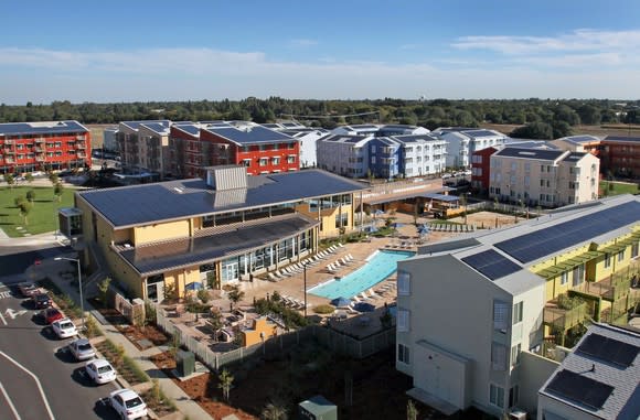 A community with solar panels on the roofs.