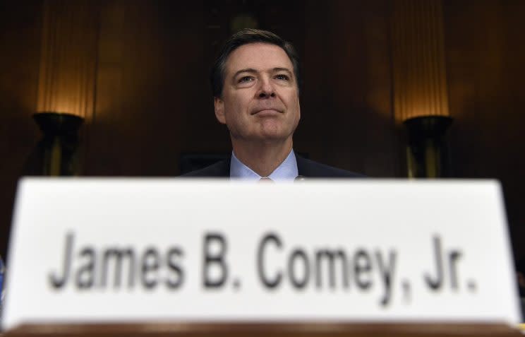 FBI Director James Comey prepares to testify on Capitol Hill in Washington in December of 2015. (Photo: Susan Walsh/AP)