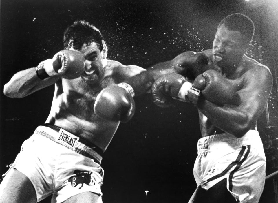 Larry Holmes (R) connects with a right hook against Gerry Cooney during the fight at Caesars Palace, on June 11, 1982 in Las Vegas, Nevada. (Getty Images)