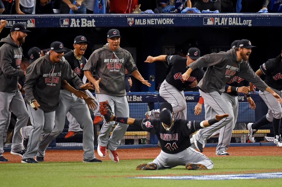 Cleveland first baseman Carlos Santana celebrates after making the final catch to beat the Blue Jays in Game 5 of the 2016 American League Championship Series.