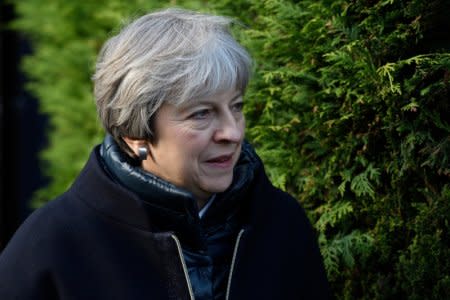 Britain's Prime Minister, Theresa May, joins Sutton and Cheam Member of Parliament (MP), Paul Scully, as he campaigns for the forthcoming London local elections, in south west London, Britain January 13, 2018. REUTERS/Leon Neal/Pool