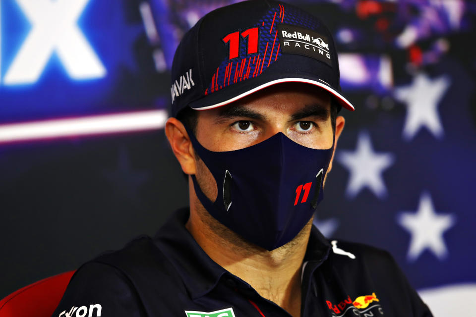 AUSTIN, TEXAS - OCTOBER 24: Third placed Sergio Perez of Mexico and Red Bull Racing talks in the press conference after the F1 Grand Prix of USA at Circuit of The Americas on October 24, 2021 in Austin, Texas. (Photo by Zak Mauger - Pool/Getty Images)