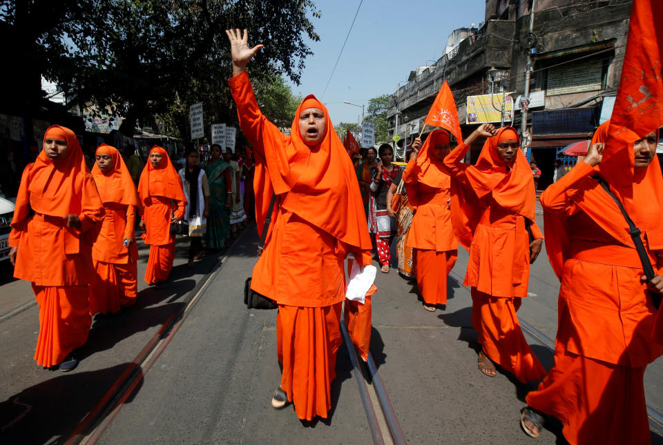 Hindu nuns shout slogans during a rally to mark International Women's Day.