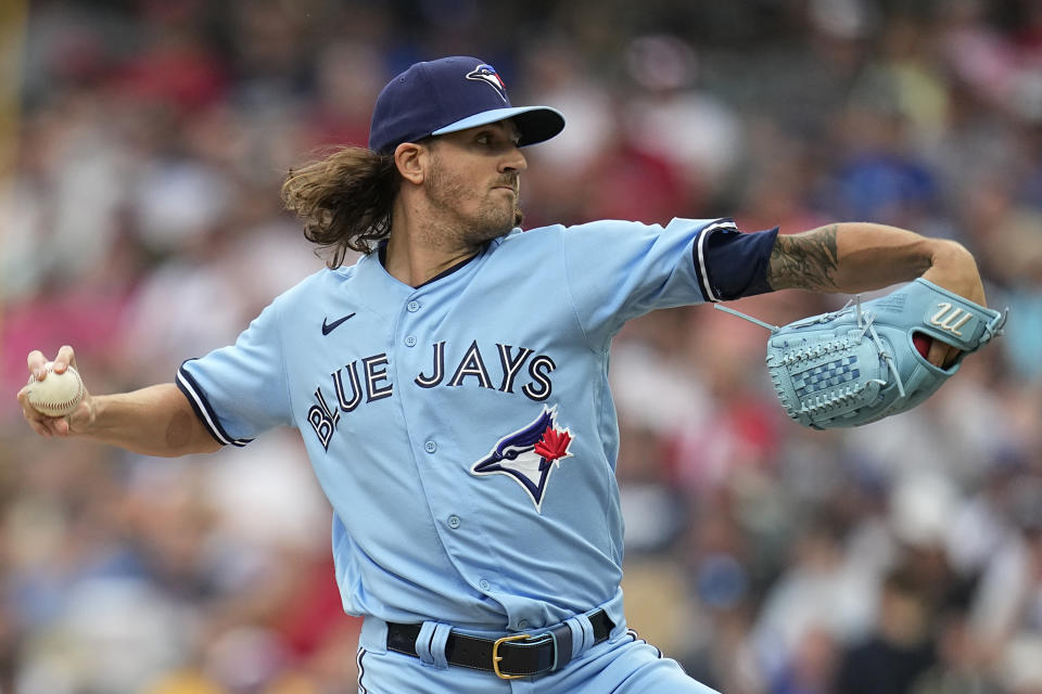 Toronto Blue Jays' Kevin Gausman pitches to a Cleveland Guardians batter during the first inning of a baseball game Wednesday, Aug. 9, 2023, in Cleveland. (AP Photo/Sue Ogrocki)