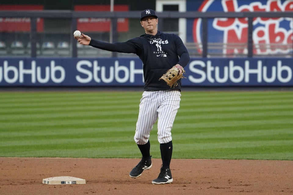 New York Yankees' DJ LeMahieu works out ahead of Game 1 of baseball's American League Division Series against the Cleveland Guardians, Monday, Oct. 10, 2022, in New York. (AP Photo/John Minchillo)