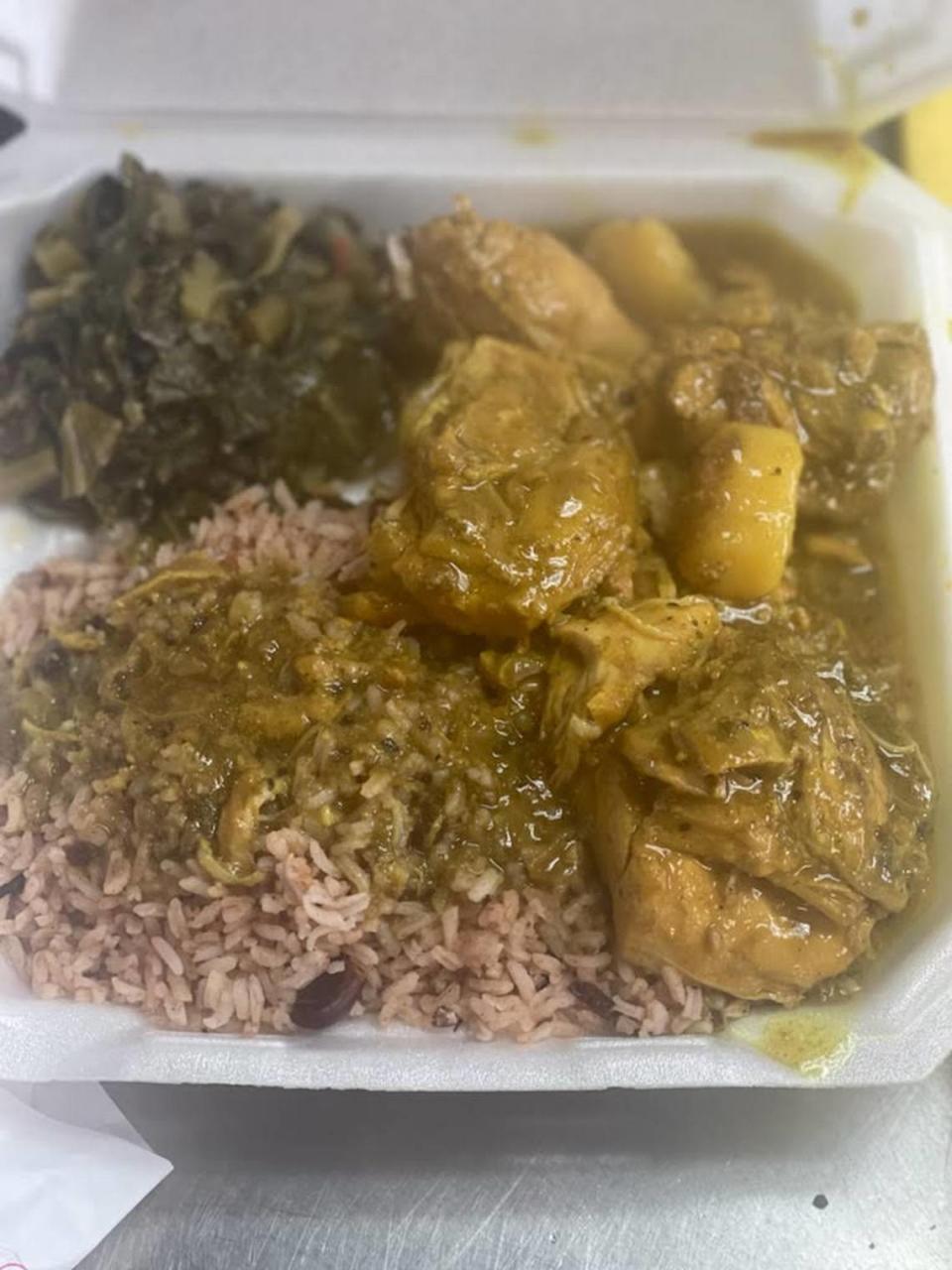 Curry chicken with collards and rice with peas from Crooklyn New York Caribbean Cuisine in Macon.
