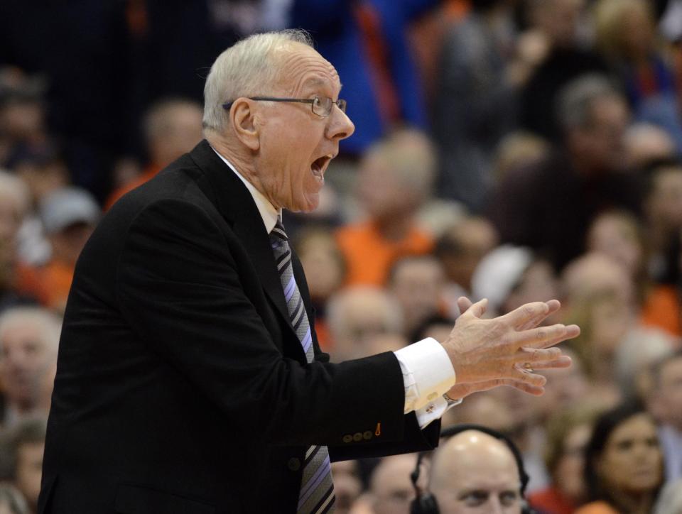Syracuse head coach Jim Boeheim shouts at his players against Notre Dame during the first half of an NCAA college basketball game in Syracuse, N.Y., Monday, Feb. 3, 2014. (AP Photo/Kevin Rivoli)
