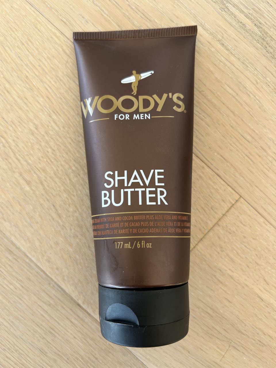 woody's for men shave butter photographed on the floor