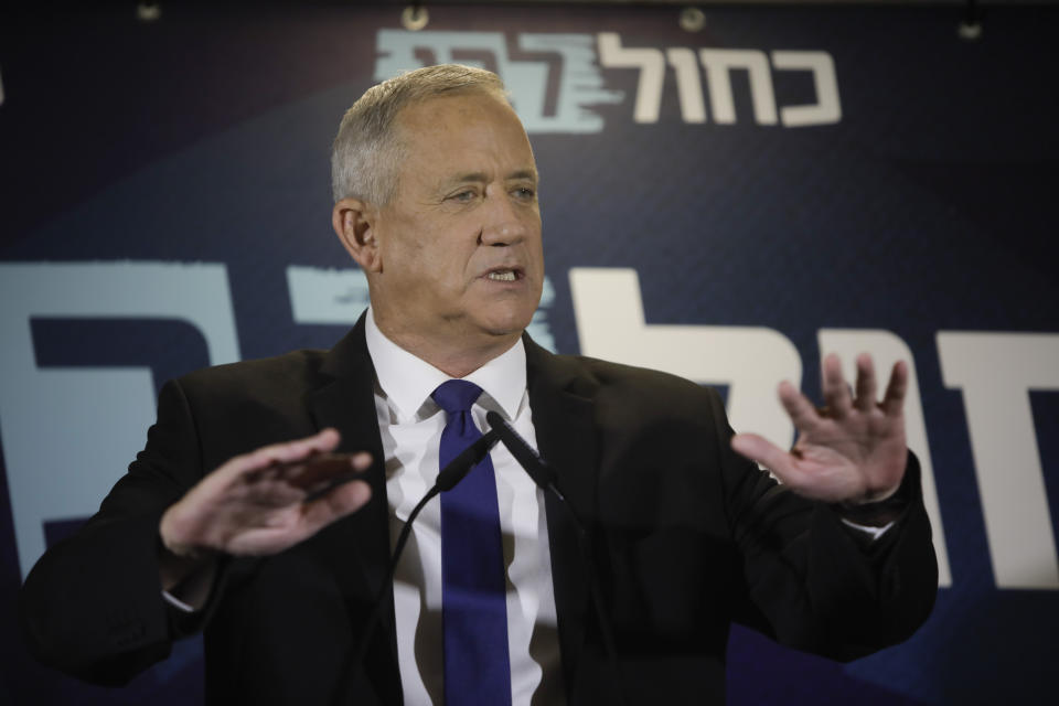 Blue and White party leader Benny Gantz delivers a statement in Tel Aviv, Thursday, Sept. 19, 2019. Benny Gantz's Blue and White has pledged not to sit in the same government as Netanyahu, as the long-serving Israeli leader is expected to face indictment in a slew of corruption scandals. (AP Photo/Sebastian Scheiner)