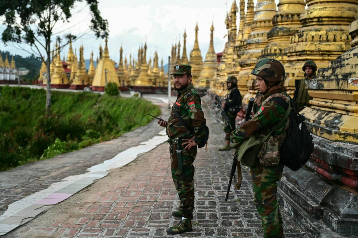 Members of the rebel Ta'ang National Liberation Army standing guard in Shan state, Myanmar. <a href="https://www.gettyimages.com/detail/news-photo/this-photo-taken-on-december-13-2023-shows-members-of-news-photo/1851374184?adppopup=true" rel="nofollow noopener" target="_blank" data-ylk="slk:STR/AFP via Getty Images;elm:context_link;itc:0;sec:content-canvas" class="link ">STR/AFP via Getty Images</a>