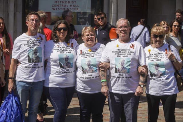 Victims and campaigners outside Central Hall in Westminster, London, after the publication of the Infected Blood Inquiry report