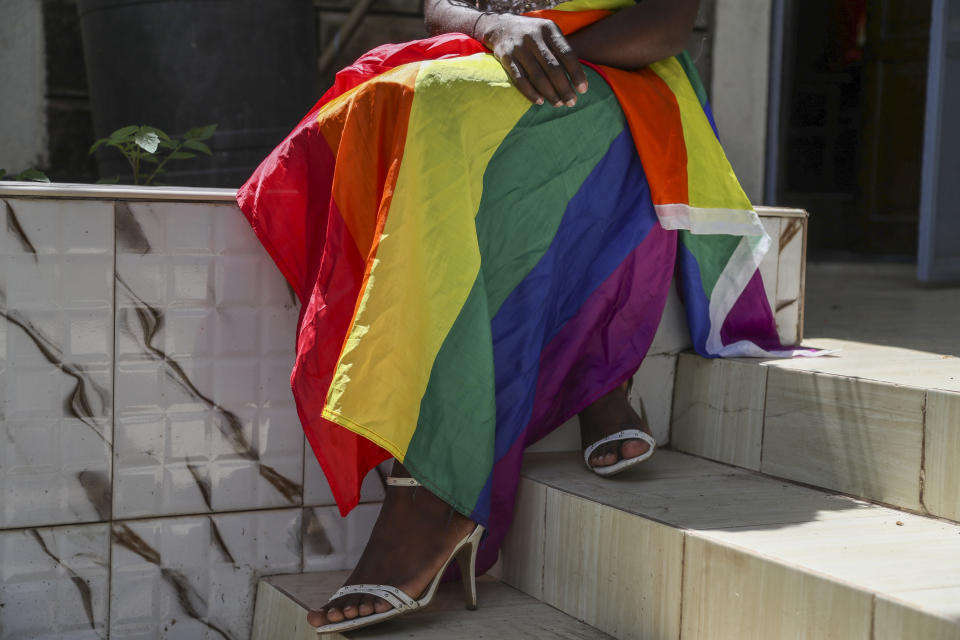 Ugandan transgender woman Pretty Peter who fled her home and country in 2019, and wished to be identified by her chosen name out of concern for her safety, poses for a photograph at the safe house where she now lives in Nairobi, the capital of neighboring Kenya Thursday, June 1, 2023. She says frightened members of the Ugandan LGBTQ+ community are searching for a way to get out of the country and some have stayed indoors since new anti-gay legislation was signed on Monday. (AP Photo/Brian Inganga)