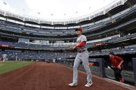 Los Angeles Angels pitcher Shohei Ohtani walks onto the field to warm up before his start against the New York Yankees in a baseball game Wednesday, June 30, 2021, in New York. (AP Photo/Adam Hunger)