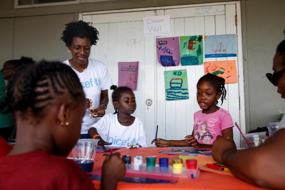 <p>Barbudan children paint in a shelter in Antigua for those forced to leave the island just after a month after Hurricane Irma struck the Caribbean islands of Antigua and Barbuda, October 7, 2017. REUTERS/Shannon Stapleton </p>