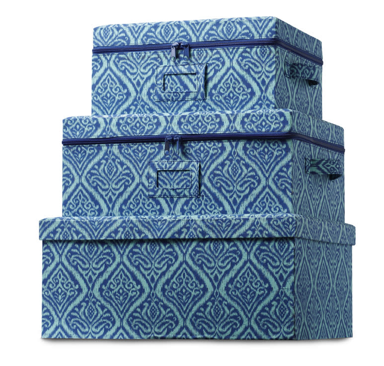 This undated publicity photo provided by HomeGoods shows a set of storage boxes in a deep blue print that add blue accents to a room in a practical way (www.homegoods.com). (AP Photo/HomeGoods)