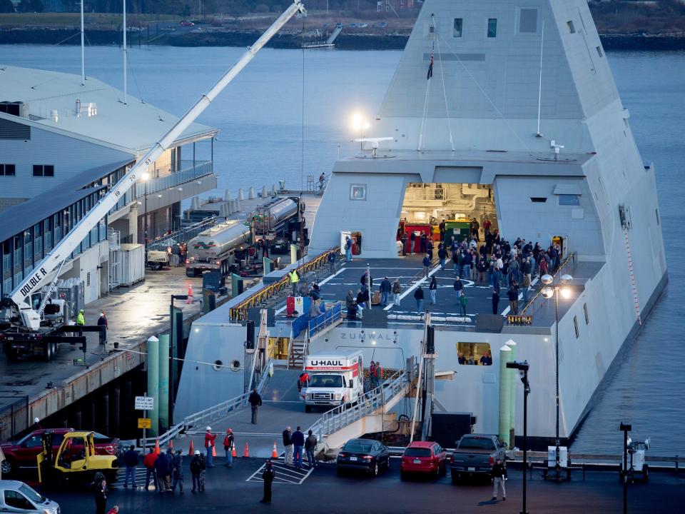 The USS Zumwalt, a guided missile destroyer, is loaded with supplies and other needs while its docked at the Ocean Gateway Terminal in Portland Thursday, December 10, 2015.