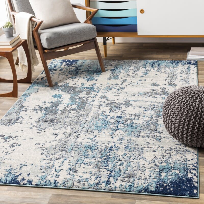 Wyona Abstract Light Gray Area Rug. Image via Wayfair.