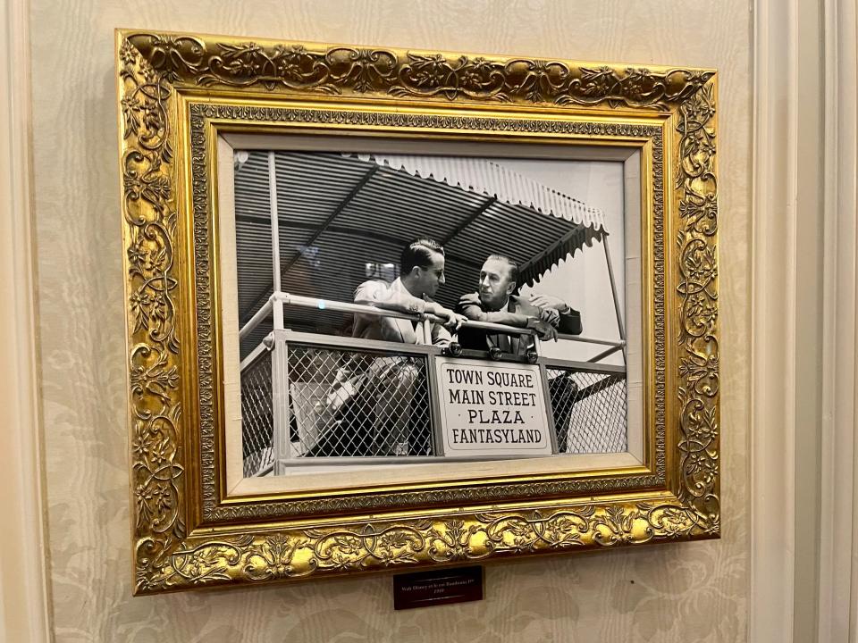 framed photo inside walt's restaurant in disneyland paris