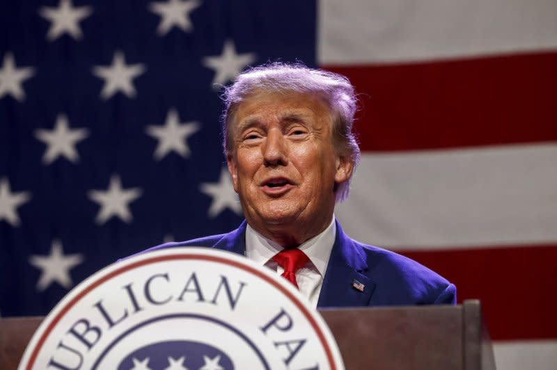 Former President Donald Trump arrives to speak at the 2023 Republican Party of Iowa Lincoln Dinner in Des Moines, Iowa, on Friday. Trump boasted of his accomplishments as president and his poll numbers. Photo by Tannen Maury/UPI