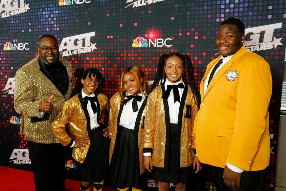 Members of the Detroit Youth Choir, with director Anthony White, left, on the red carpet of NBC's "America's Got Talent: All Stars."