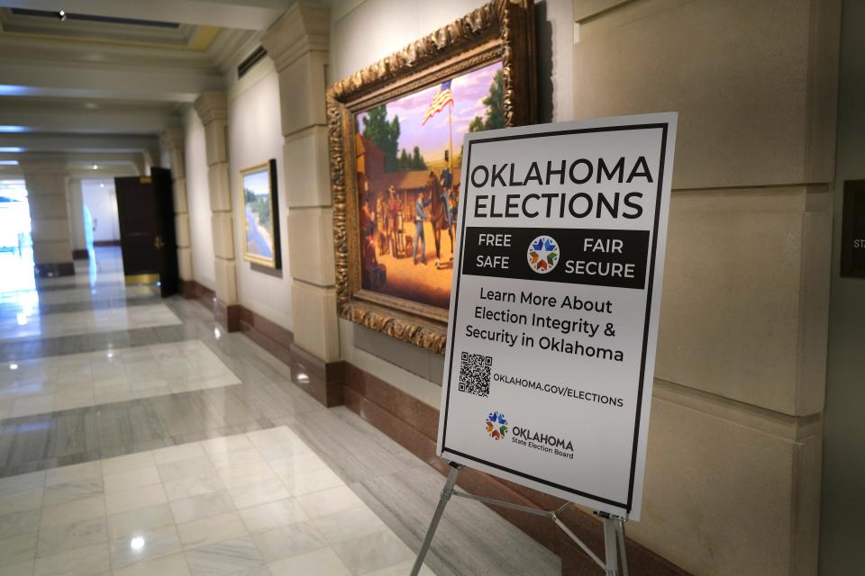 A sign on the ground floor during a meeting of the state election board at the Oklahoma Capitol, Wednesday, Jan. 31, 2024.