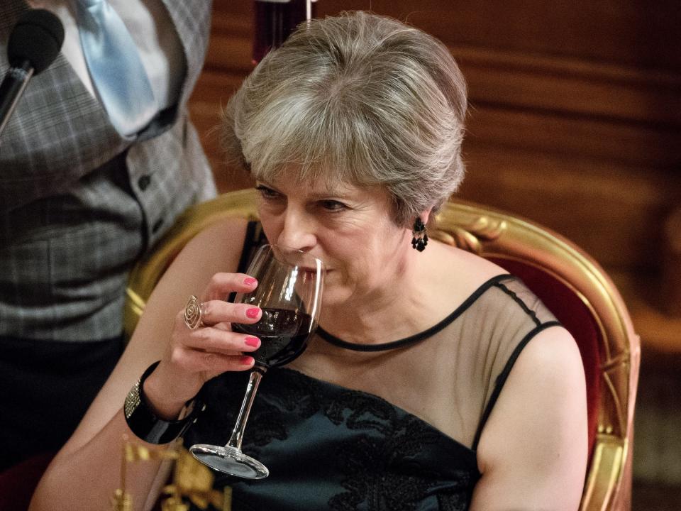 theresa may drink red wine glass alcohol