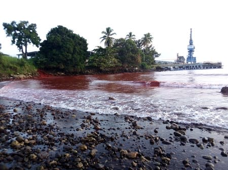 Waste from a nickel plant in Papua New Guinea owned by Metallurgical Corporation of China is seen in the waters of the adjacent Basamuk Bay