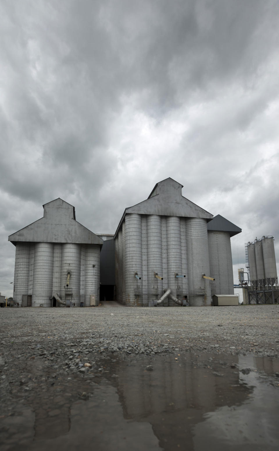 Storm clouds leading remnants of Hurricane Isaac gather in the skies over a grain elevator in England, Ark., Thursday, Aug. 30, 2012. With the storms approaching many farm states, some farmers wonder whether too much relief is on the horizon. (AP Photo/Danny Johnston)