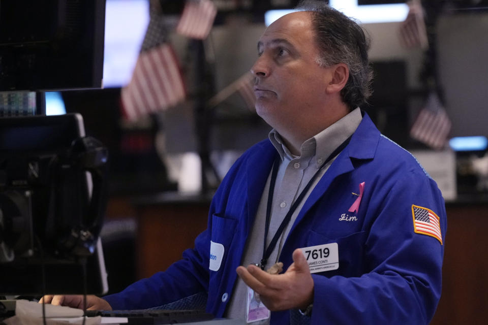 Trader James Conti works on the floor of the New York Stock Exchange, Wednesday, Aug. 7, 2024. (AP Photo/Richard Drew)