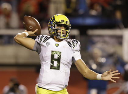 Oregon's Marcus Mariota has thrown 29 TDs and only two INTs this season. (AP)