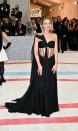 <p>If Margot Robbie’s black corsetted gown looks familiar to you, it’s because it’s from the Spring 1993 couture line!</p>