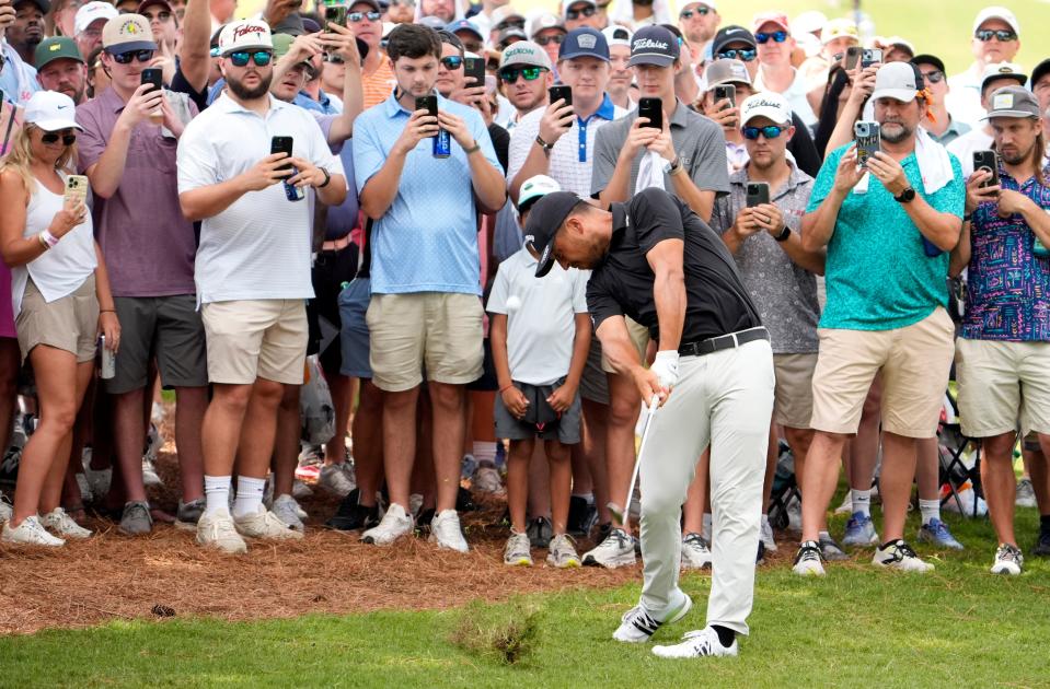 Xander Schauffele lays his shot from the first fairway rough during the third round of the TOUR Championship golf tournament. Mandatory Credit: John David Mercer-USA TODAY Sports