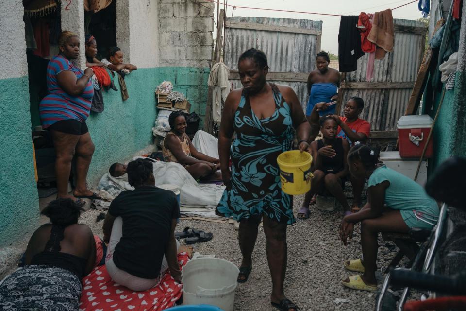 <br>Internally displaced people at a makeshift camp in downtown Port-au-Prince