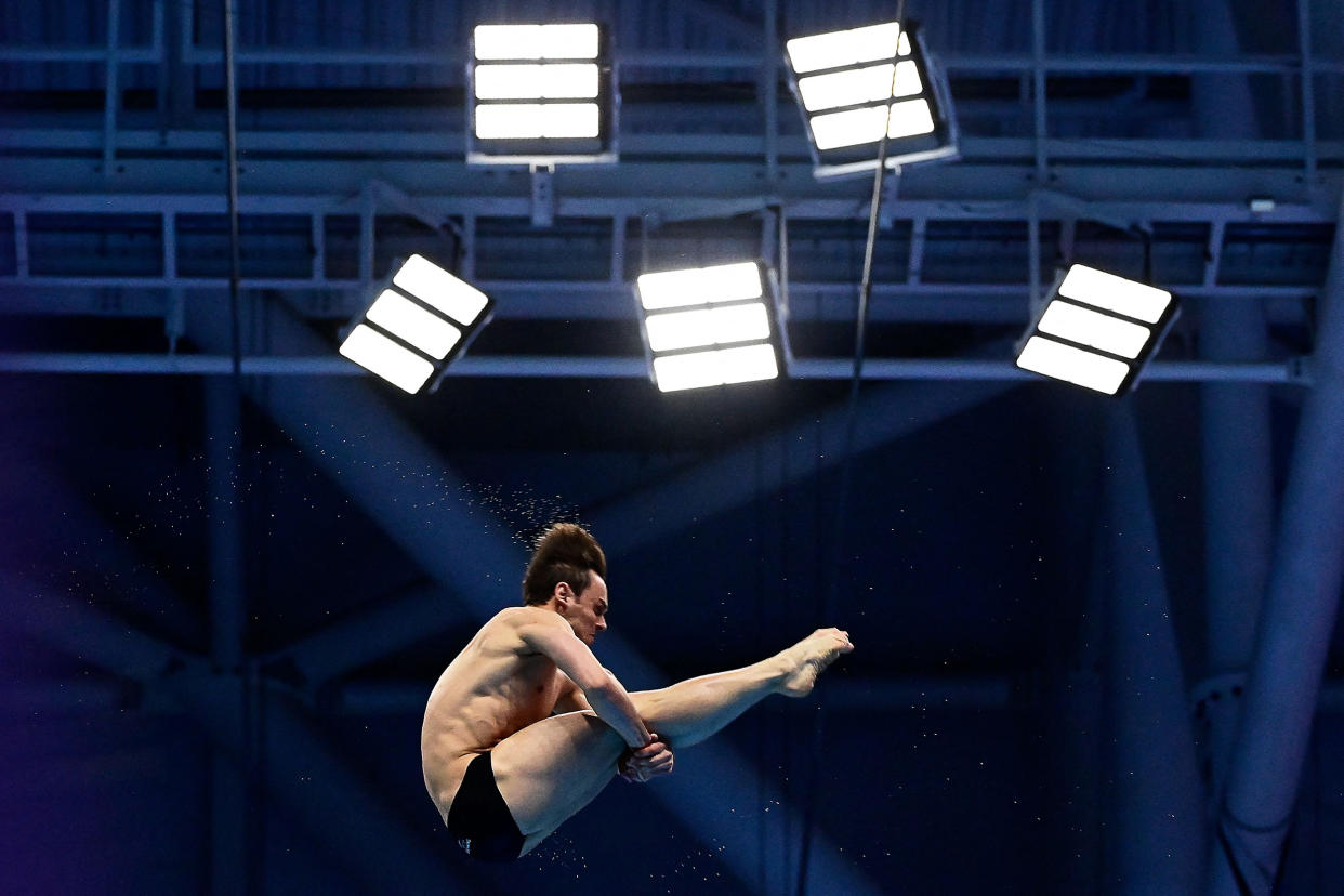 Image: Thomas Daley competes in the final of the Men's 10m Platform Diving event during the LEN European Aquatics Championships in Budapest on May 16, 2021. (Tobias Schwarz / AFP via Getty Images)