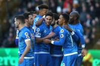 <p>Bournemouth celebrate taking the lead at Hull</p>